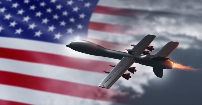 Military,Drone,With,Us,Flag.,Uav,Is,Flying,In,Sky.